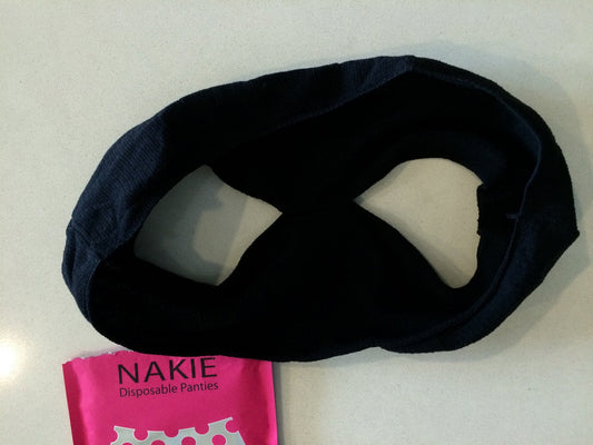 เนื้อผ้าทอด้านในของ NAKIE ถ่ายใกล้ให้เห็นความนุ่มของเนื้อผ้า